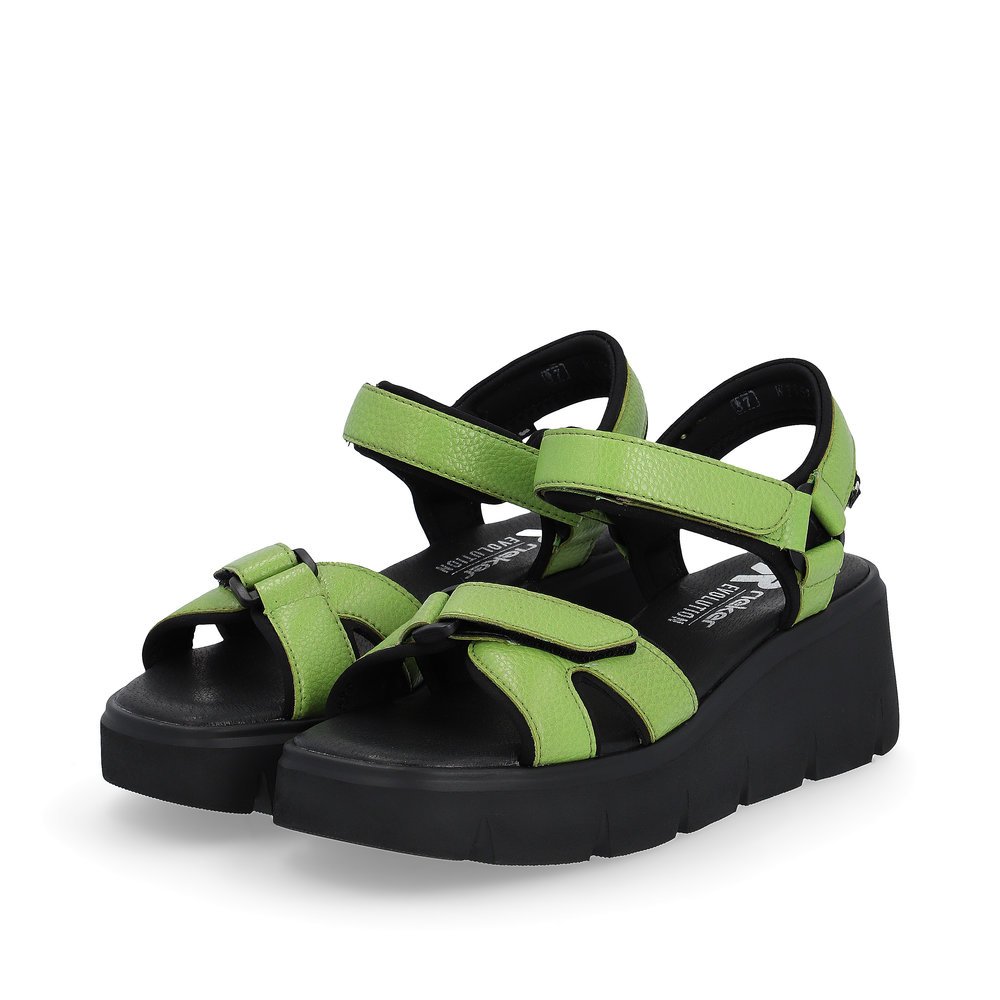 Green Rieker women´s wedge sandals W1552-52 with a flexible sole with wedge heel. Shoes laterally.