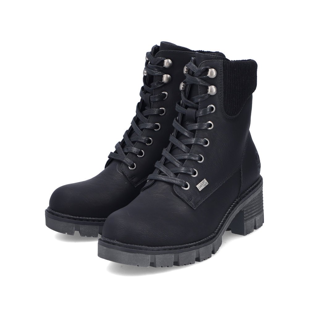 Black Rieker women´s biker boots 92041-00 with RiekerTEX membrane as well as zipper. Shoes laterally.