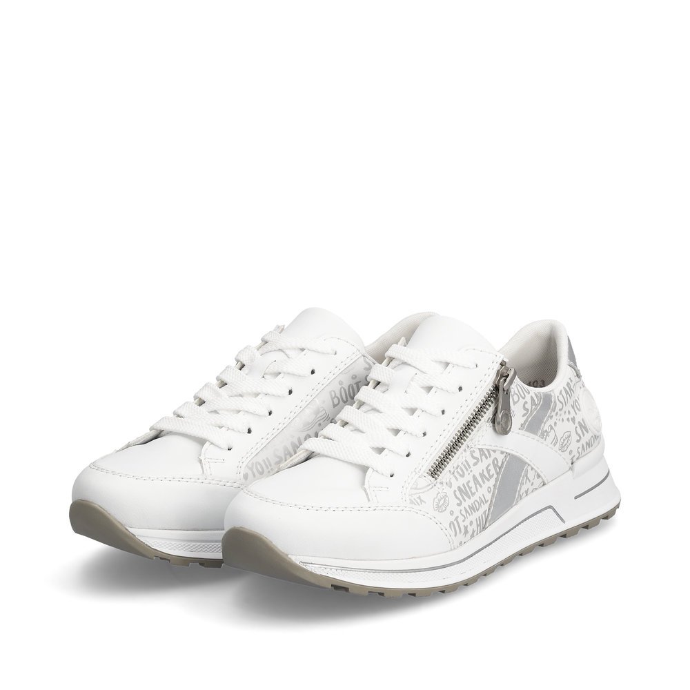 Rieker baskets basses blanches femmes N1403-80 avec une fermeture éclair. Chaussures inclinée sur le côté.