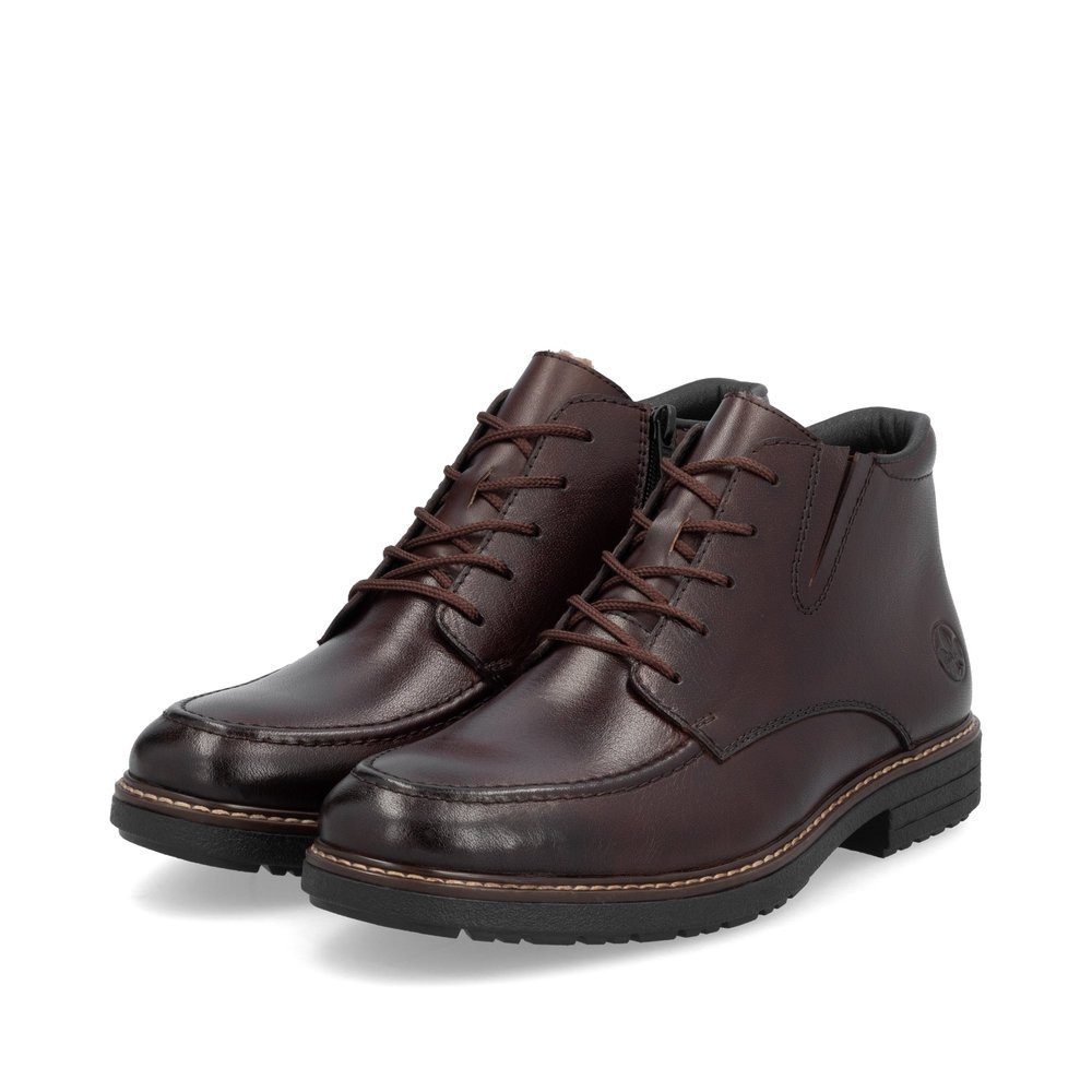 Dark brown Rieker men´s lace-up boots 33105-25 with a zipper. Shoes laterally.