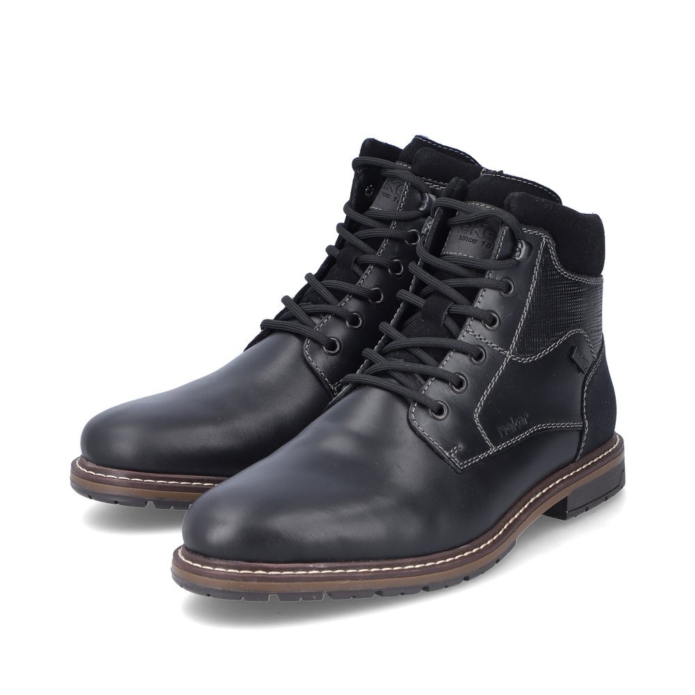 Black Rieker men´s lace-up boots 13740-00 with RiekerTEX membrane as well as zipper. Shoes laterally.