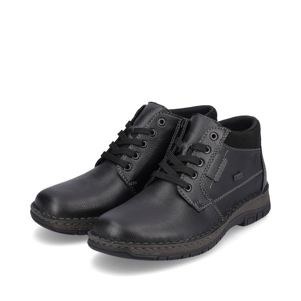 Black Rieker men´s lace-up boots 05102-00 with RiekerTEX membrane as well as zipper. Shoes laterally.