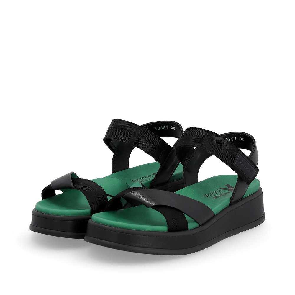 Black Rieker women´s strap sandals W0851-00 with an ultra light platform sole. Shoes laterally.