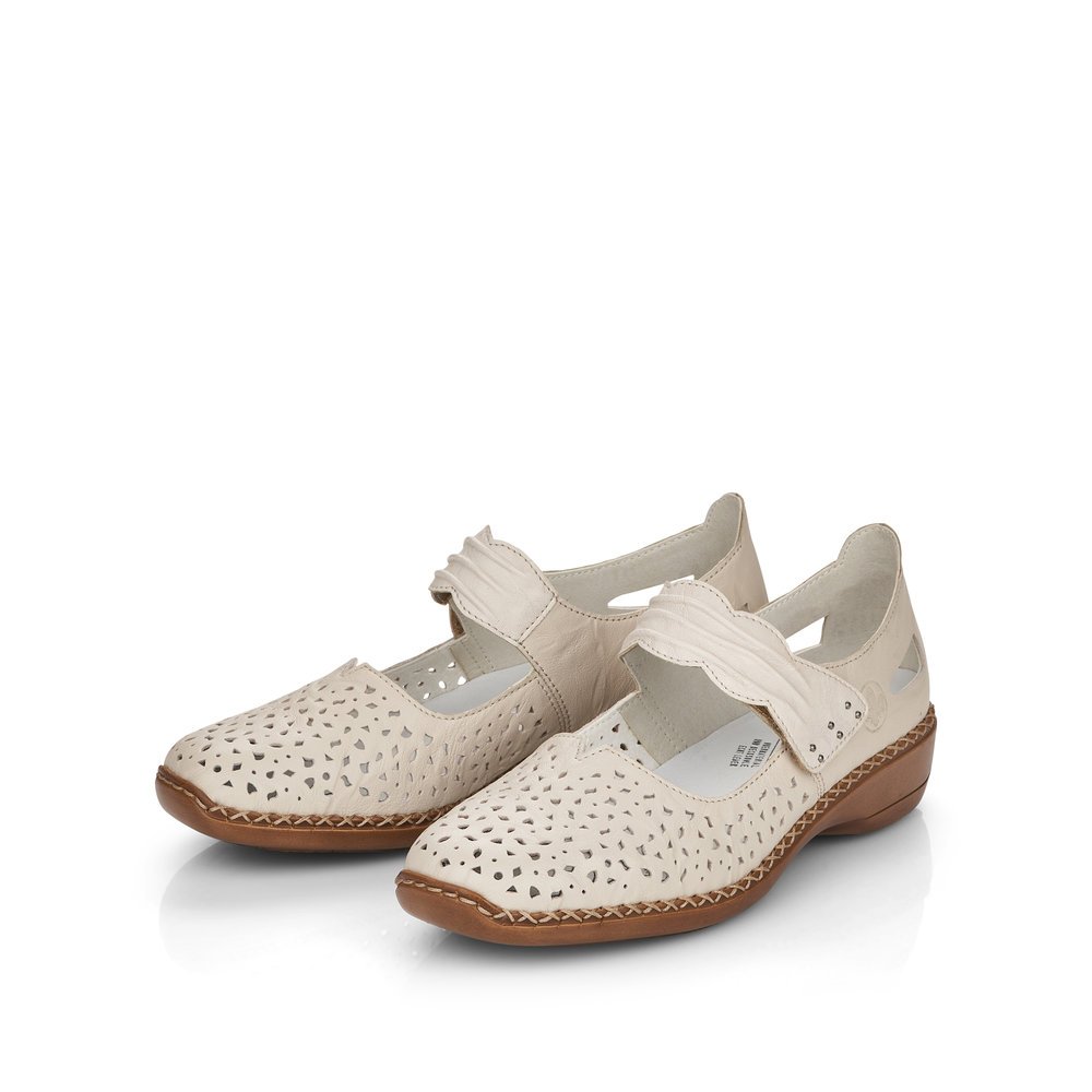 Light beige Rieker women´s ballerinas 41399-60 with a hook and loop fastener. Shoes laterally.