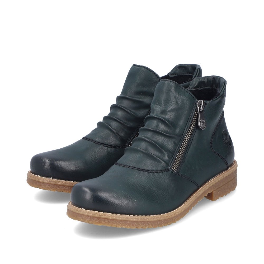 Blue-green Rieker women´s ankle boots 73553-54 with gathered look as well as zipper. Shoes laterally.