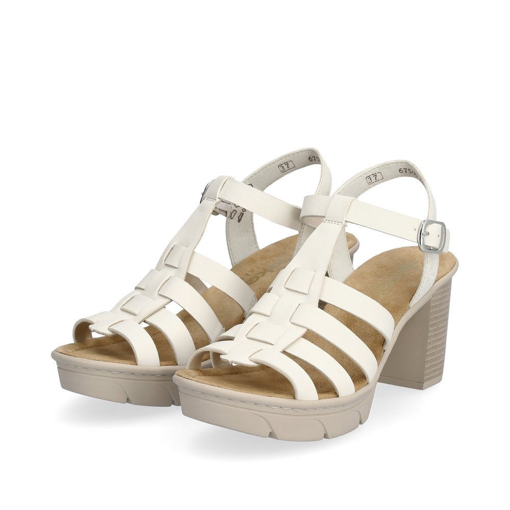 Rieker sandalettes à lanières beiges femmes 67500-60 avec une boucle. Chaussures inclinée sur le côté.