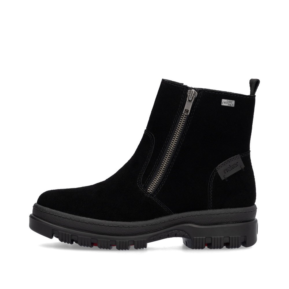 Jet black Rieker women´s ankle boots X8251-00 with a Flip-Grip sole with spikes. Outside of the shoe.