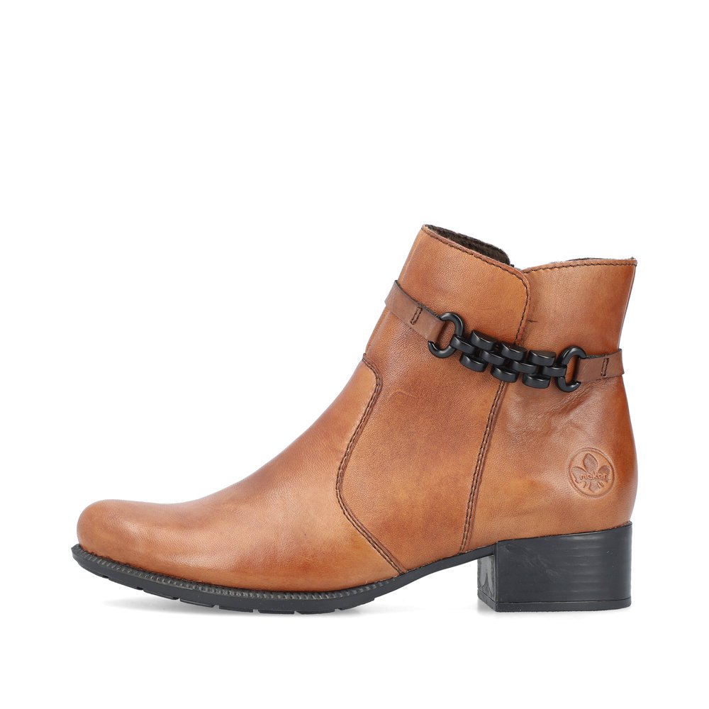 Brown Rieker women´s ankle boots 78676-25 with a brown chain element. Outside of the shoe.