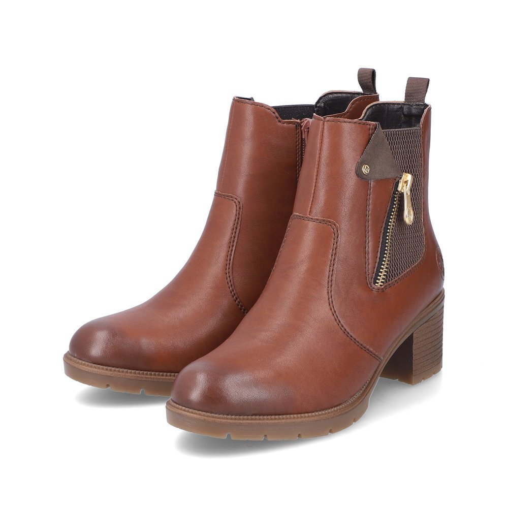 Maroon Rieker women´s ankle boots 77550-22 with decorative zipper as well as zipper. Shoes laterally.