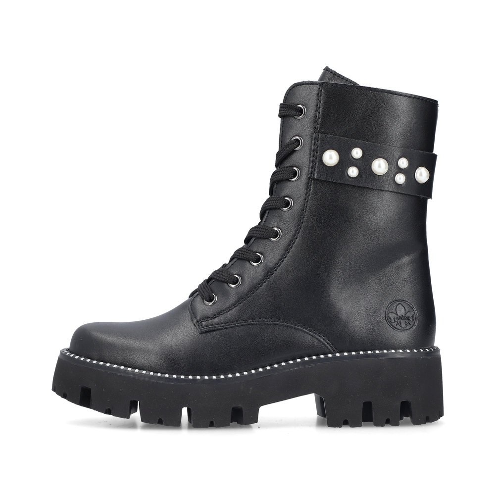 Black Rieker women´s biker boots Y3354-00 with a pearl decoration as well as zipper. Outside of the shoe.