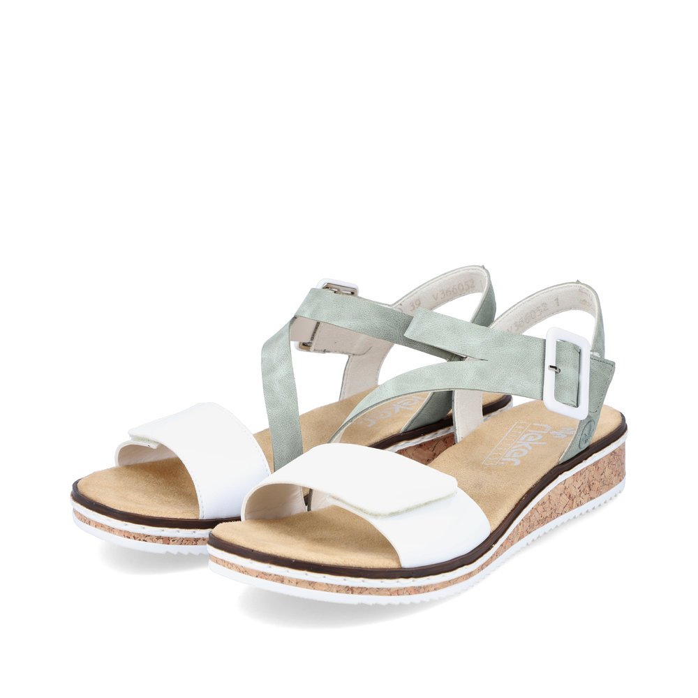 Mint green Rieker women´s wedge sandals V3660-52 with a hook and loop fastener. Shoes laterally.