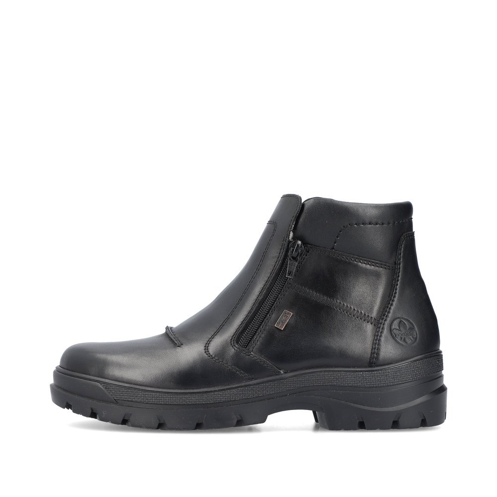 Black Rieker men´s ankle boots F5463-00 with a Flip-Grip sole with fold-out spikes. Outside of the shoe.