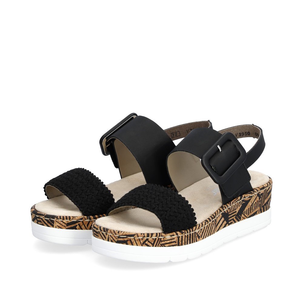 Black Rieker women´s wedge sandals V3950-00 with a hook and loop fastener. Shoes laterally.