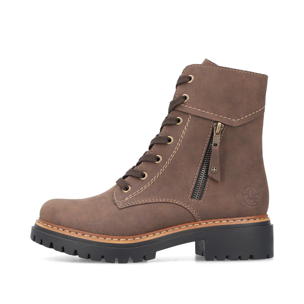 Wood brown Rieker women´s lace-up boots 72626-25 with a decorative zipper. Outside of the shoe.