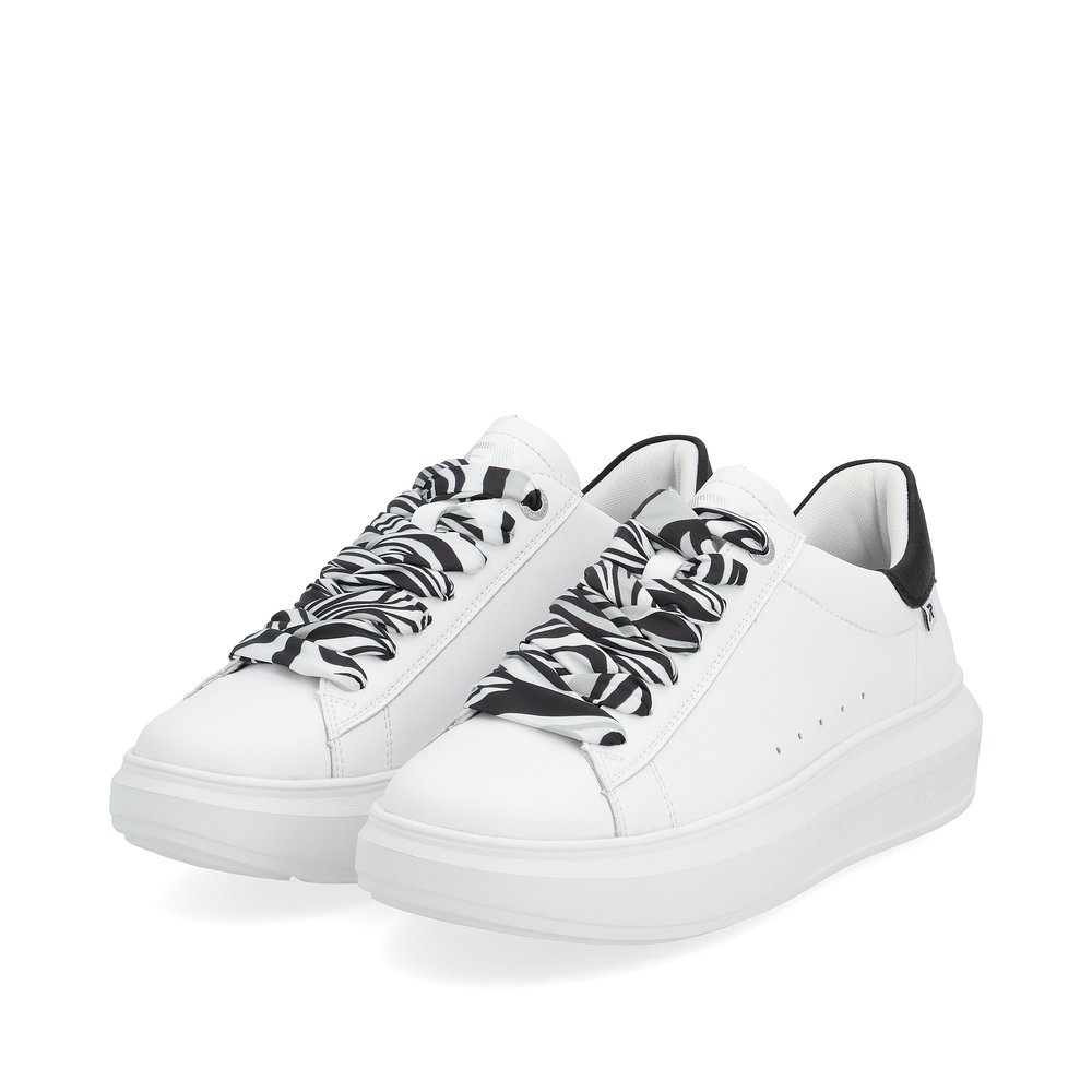 White Rieker women´s low-top sneakers W1201-80 with a flexible sole. Shoes laterally.