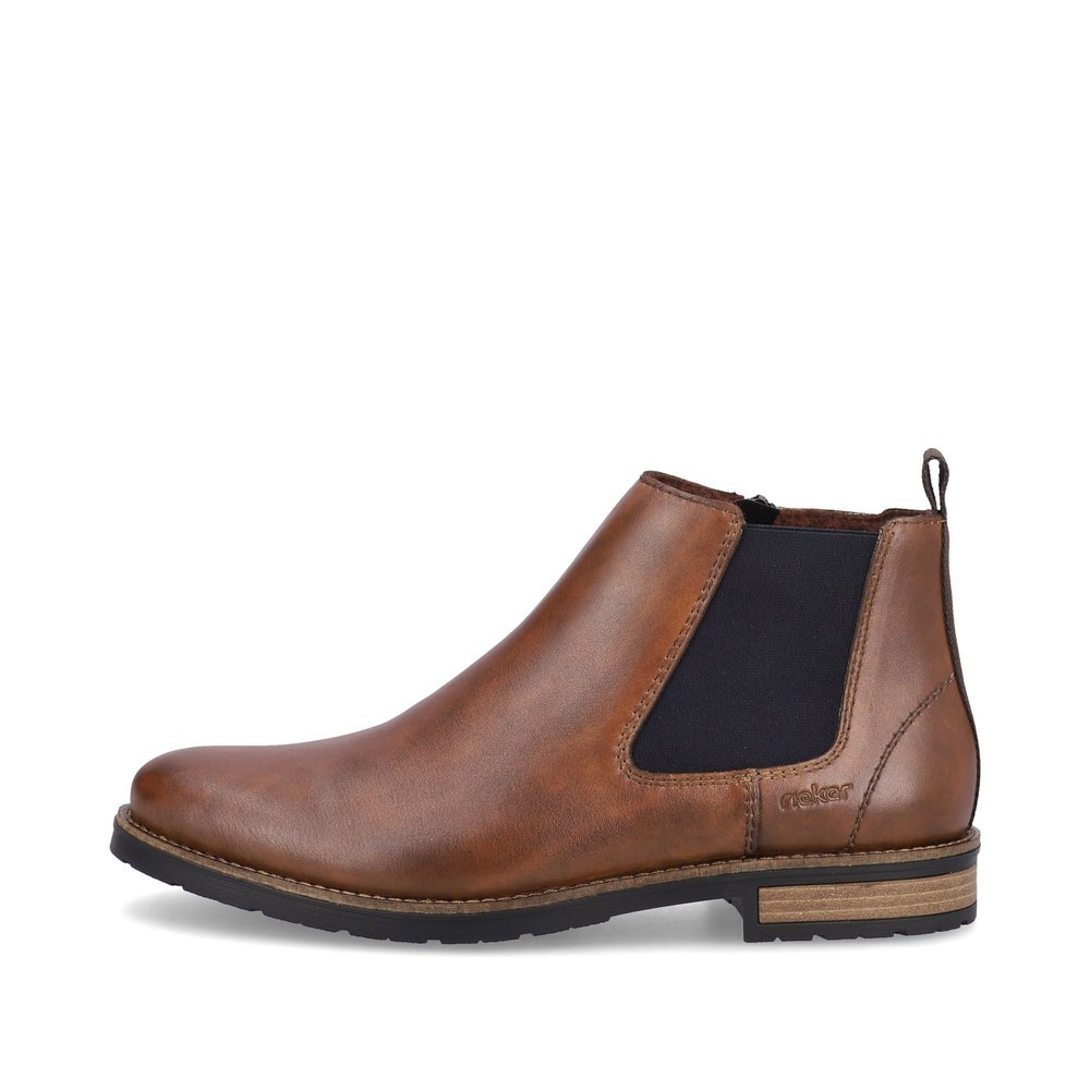 Chocolate brown Rieker men´s Chelsea boots 14653-24 with a zipper. Outside of the shoe.