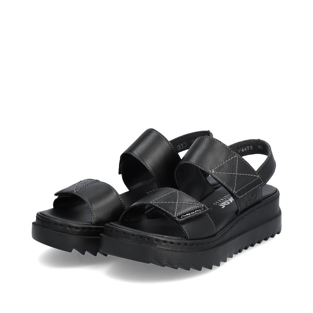Night black Rieker women´s strap sandals V4475-00 with a hook and loop fastener. Shoes laterally.