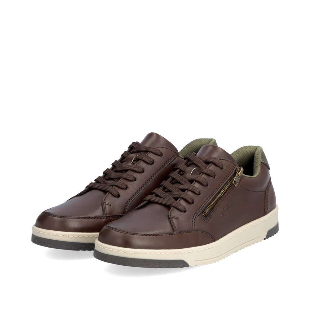 Baskets basses Rieker marron pour homme 17502-25 avec fermeture éclair. Chaussures inclinées sur le côté.