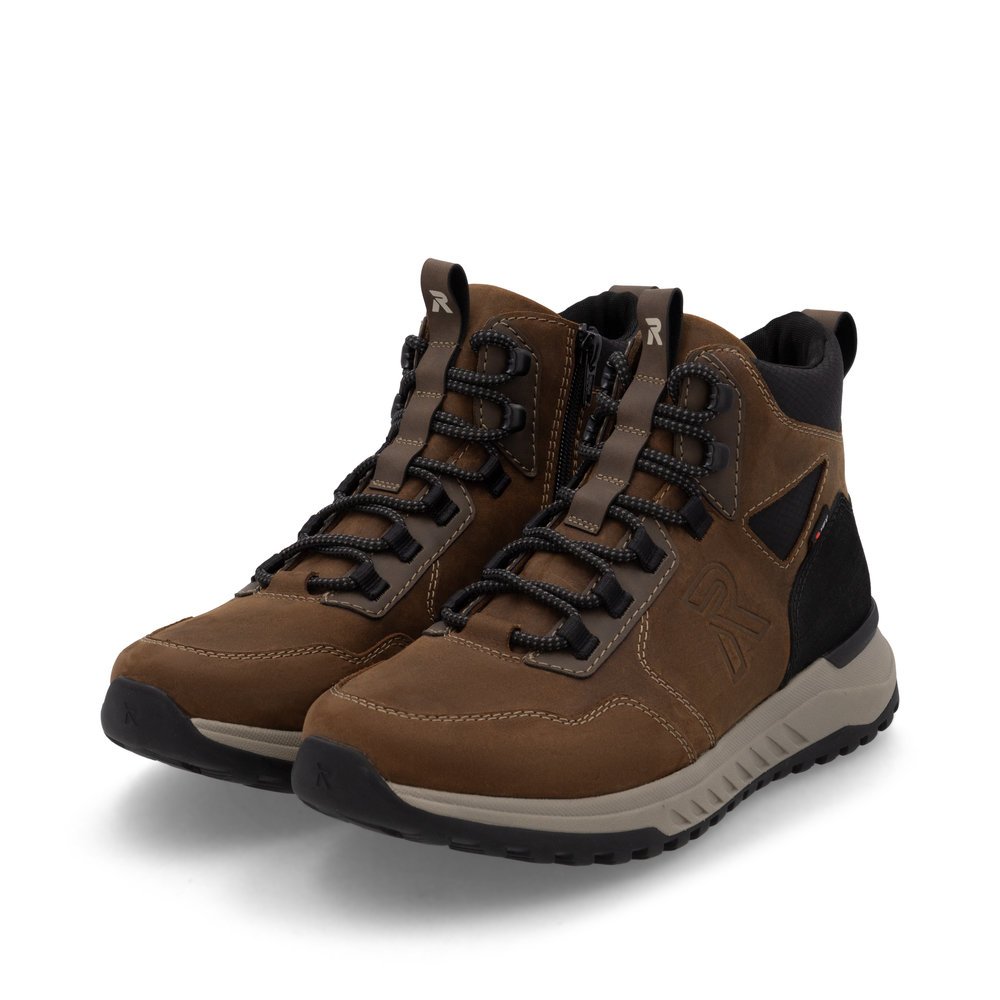 Baskets montantes Rieker marron homme U0172-22 avec membrane RiekerTEX. Chaussures inclinées sur le côté.