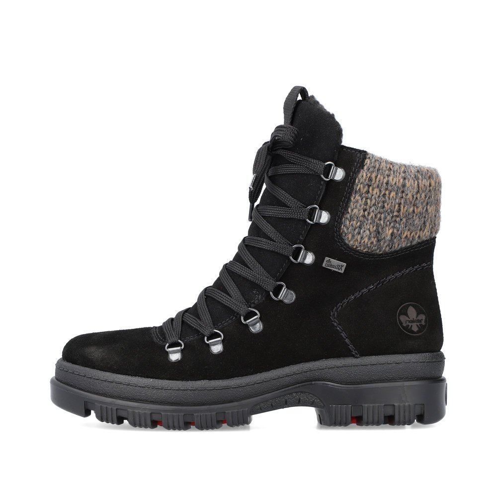 Night black Rieker women´s lace-up boots X8200-00 with a Flip-Grip sole with spikes. Outside of the shoe.