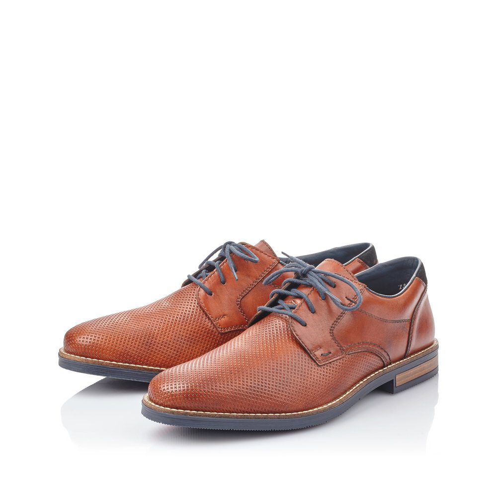 Rieker chaussures à lacets marron pour hommes 13511-24 avec largeur G 1/2. Chaussures inclinée sur le côté.