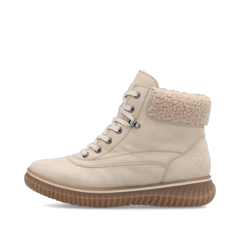 Beige Rieker women´s lace-up boots 74200-62 with a shaft collar as well as a zipper. Outside of the shoe.