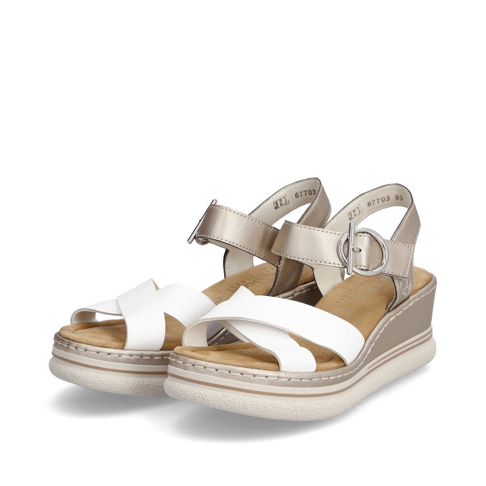 Ice white Rieker women´s wedge sandals 67703-80 with a hook and loop fastener. Shoes laterally.