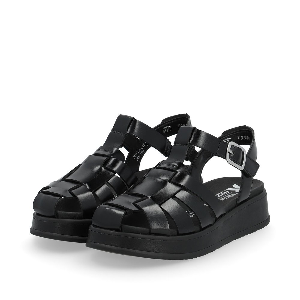 Black Rieker women´s strap sandals W0850-00 with an ultra light platform sole. Shoes laterally.