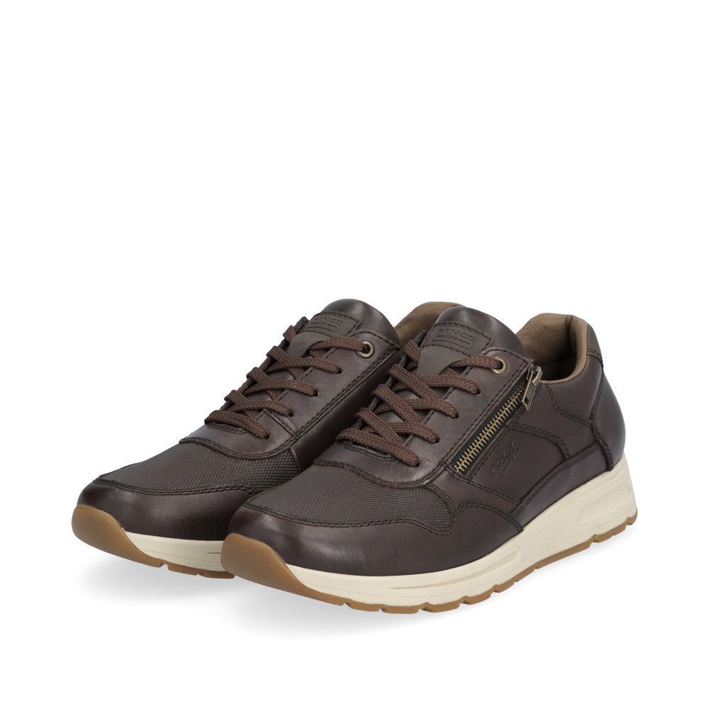 Baskets basses Rieker marron pour homme B0701-25 avec fermeture éclair. Chaussures inclinées sur le côté.