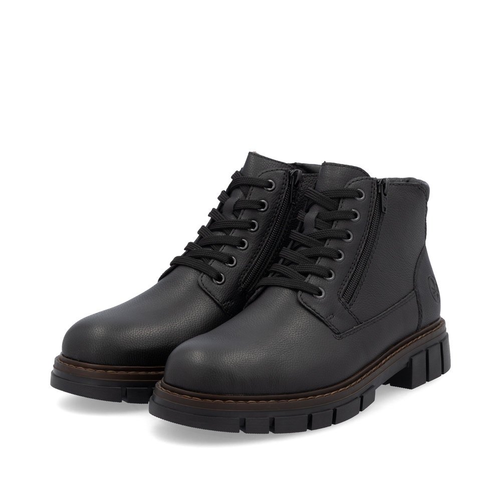 Black Rieker men´s lace-up boots 32208-00 with a zipper as well as extra width H. Shoes laterally.