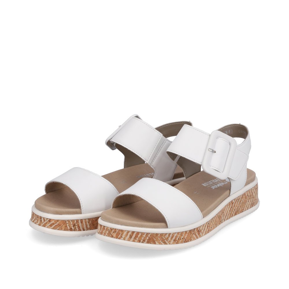 White Rieker women´s strap sandals W0800-80 with a cushioning platform sole. Shoes laterally.