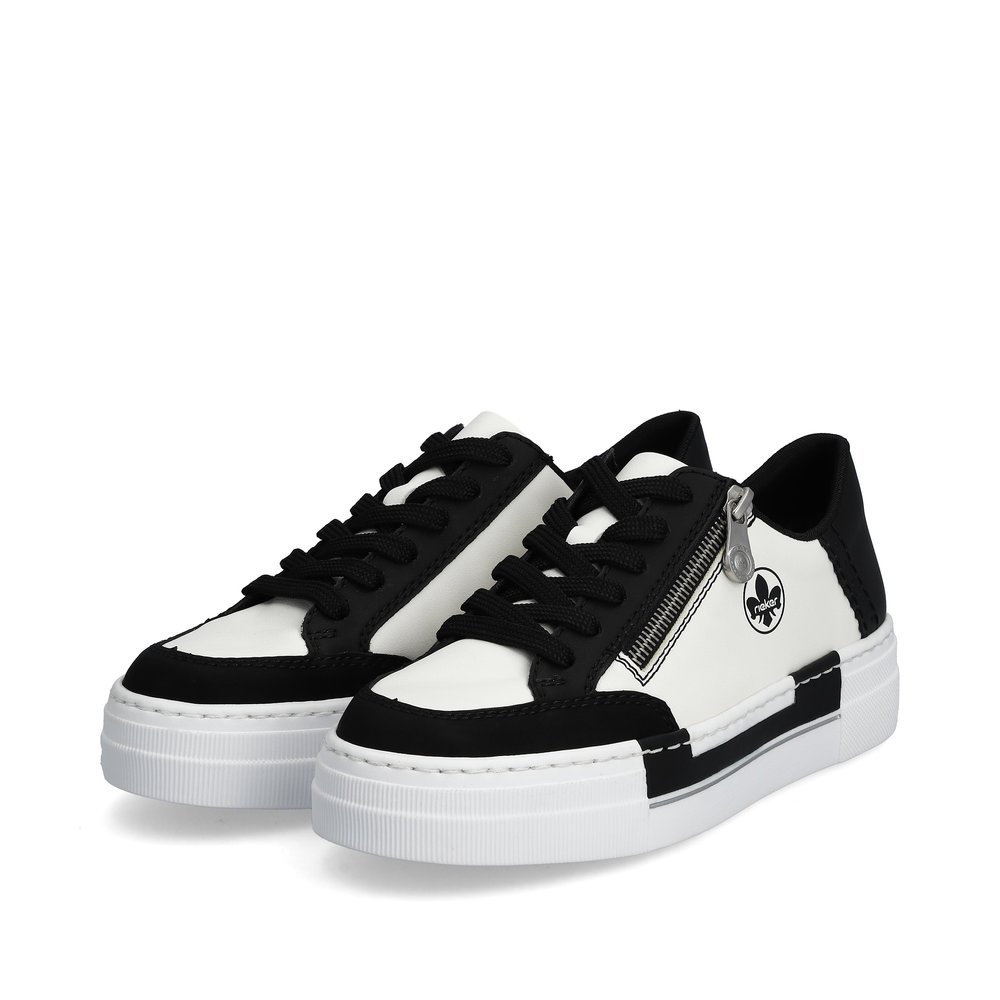 Crystal white Rieker women´s low-top sneakers N4903-80 with a zipper. Shoes laterally.
