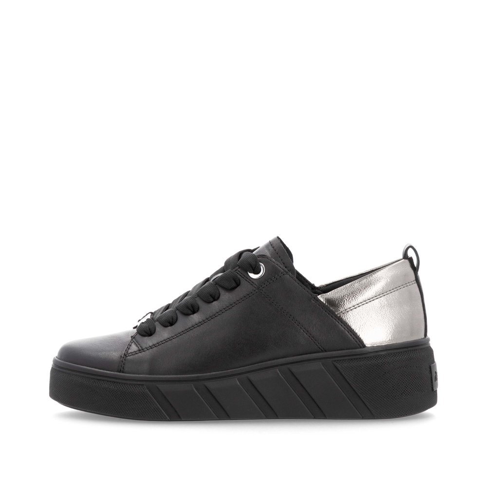 Black Rieker women´s low-top sneakers W0502-03 with an ultra light platform sole. Outside of the shoe.