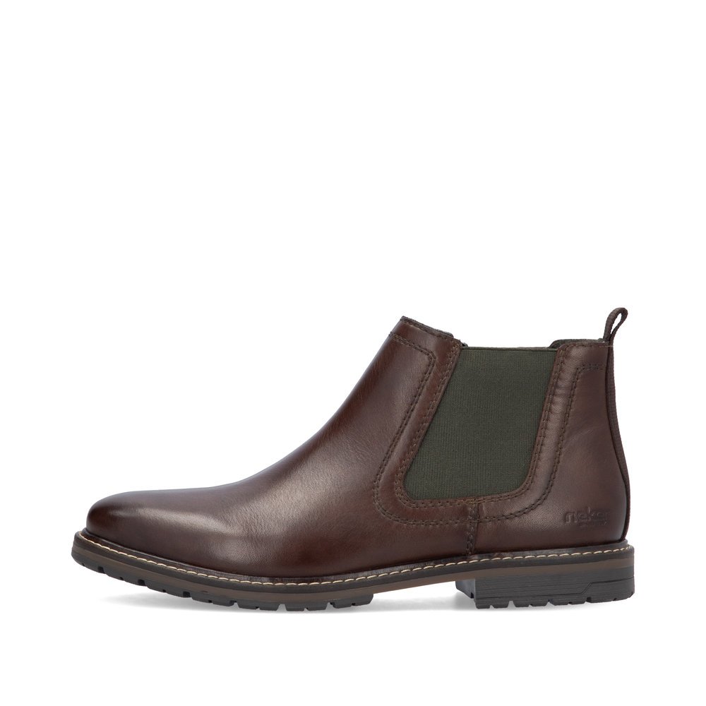 Wood brown Rieker men´s Chelsea boots 13757-25 with a zipper. Outside of the shoe.