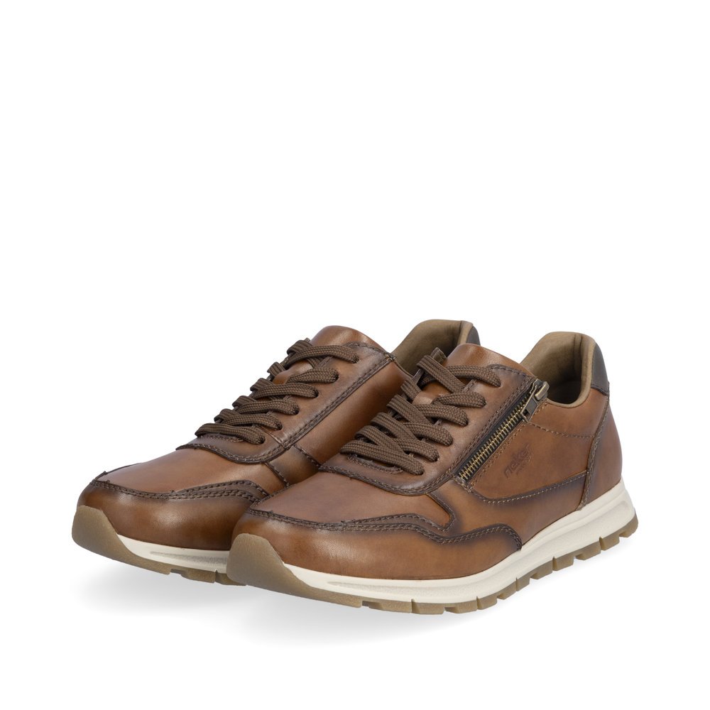 Brown Rieker men´s low-top sneakers B0504-24 with a shadow finish as well as zipper. Shoes laterally.