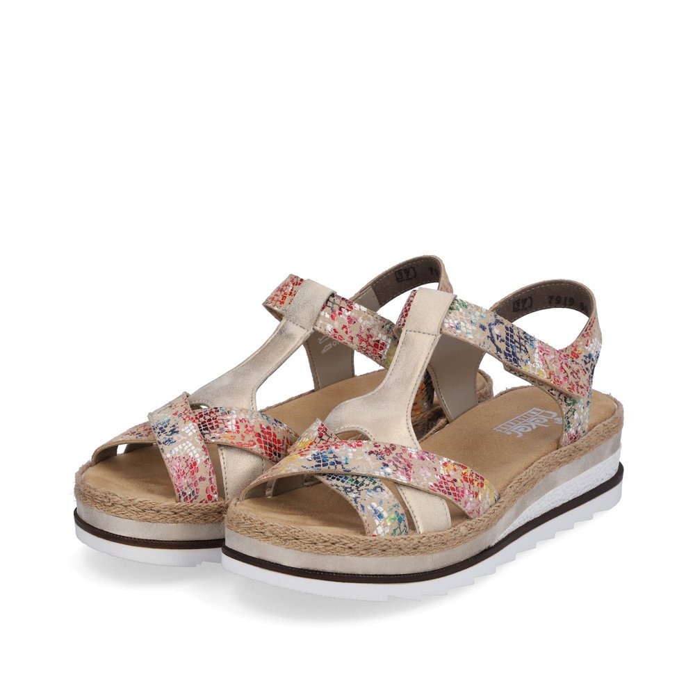 Multi-colored Rieker women´s wedge sandals V7919-90 with a hook and loop fastener. Shoes laterally.