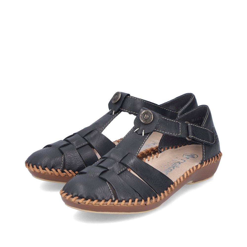 Midnight black Rieker women´s strap sandals M1675-00 with a hook and loop fastener. Shoes laterally.