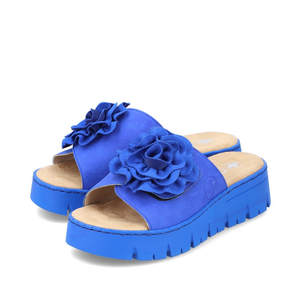 Royal blue Rieker women´s mules V1052-14 with a hook and loop fastener. Shoes laterally.