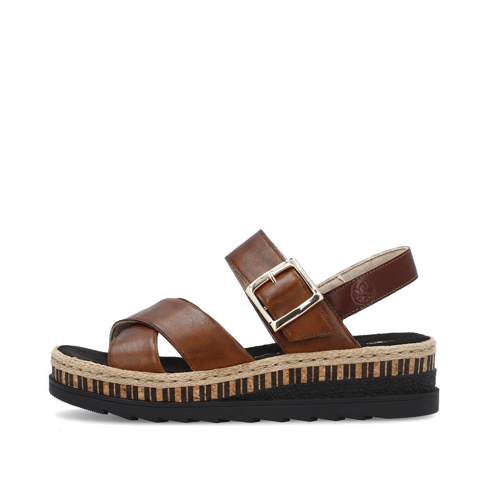 Rieker sandales compensées marron femmes V7951-24 avec fermeture velcro. Côté extérieur de la chaussure.