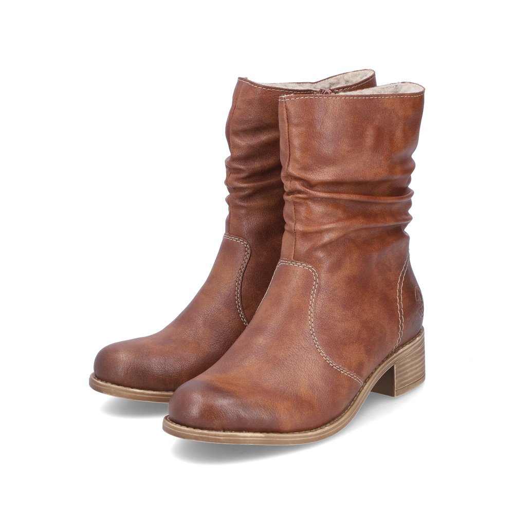 Brown Rieker women´s ankle boots 76581-24 with a gathered look as well as a zipper. Shoes laterally.