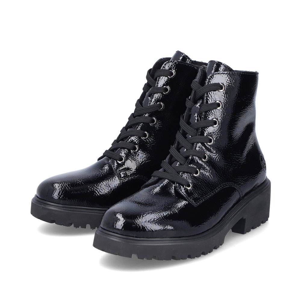 Black Rieker women´s lace-up boots 76002-00 with zipper as well as comfort width G. Shoes laterally.