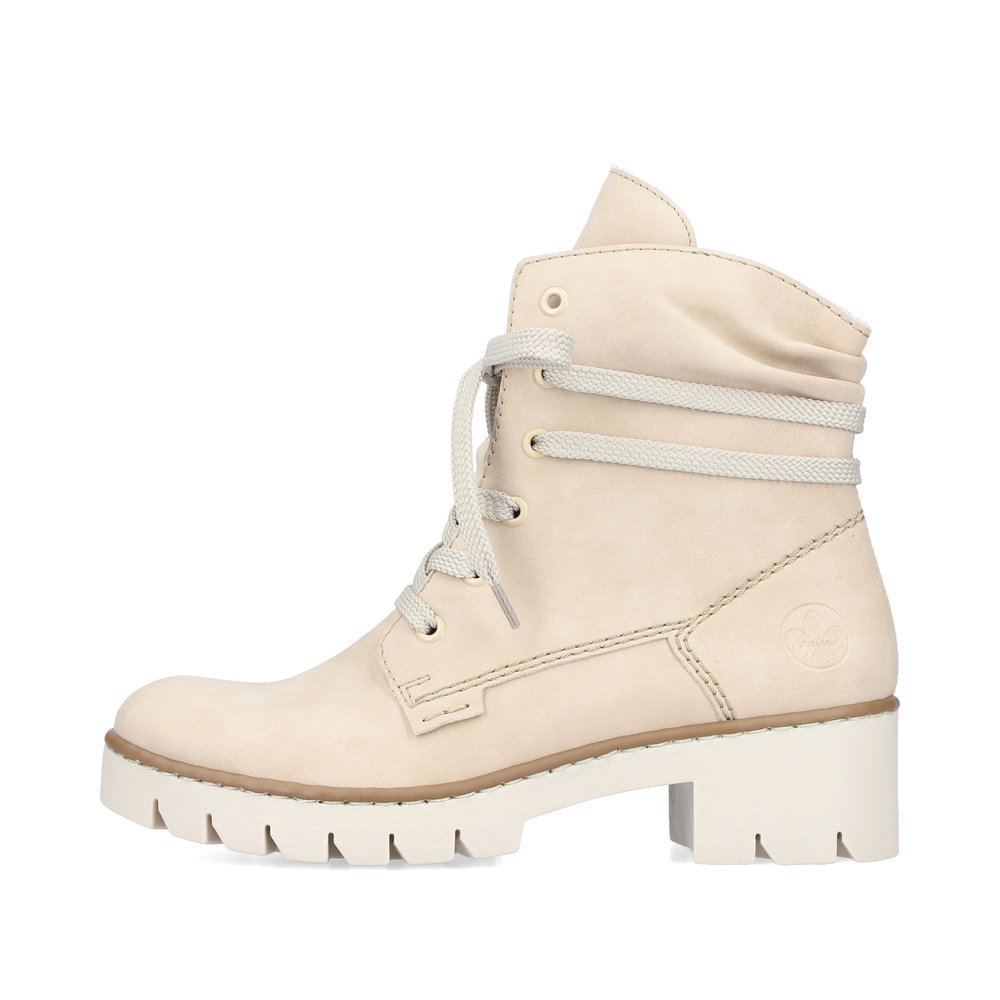 Vanilla beige Rieker women´s lace-up boots X5717-62 with a zipper. Outside of the shoe.