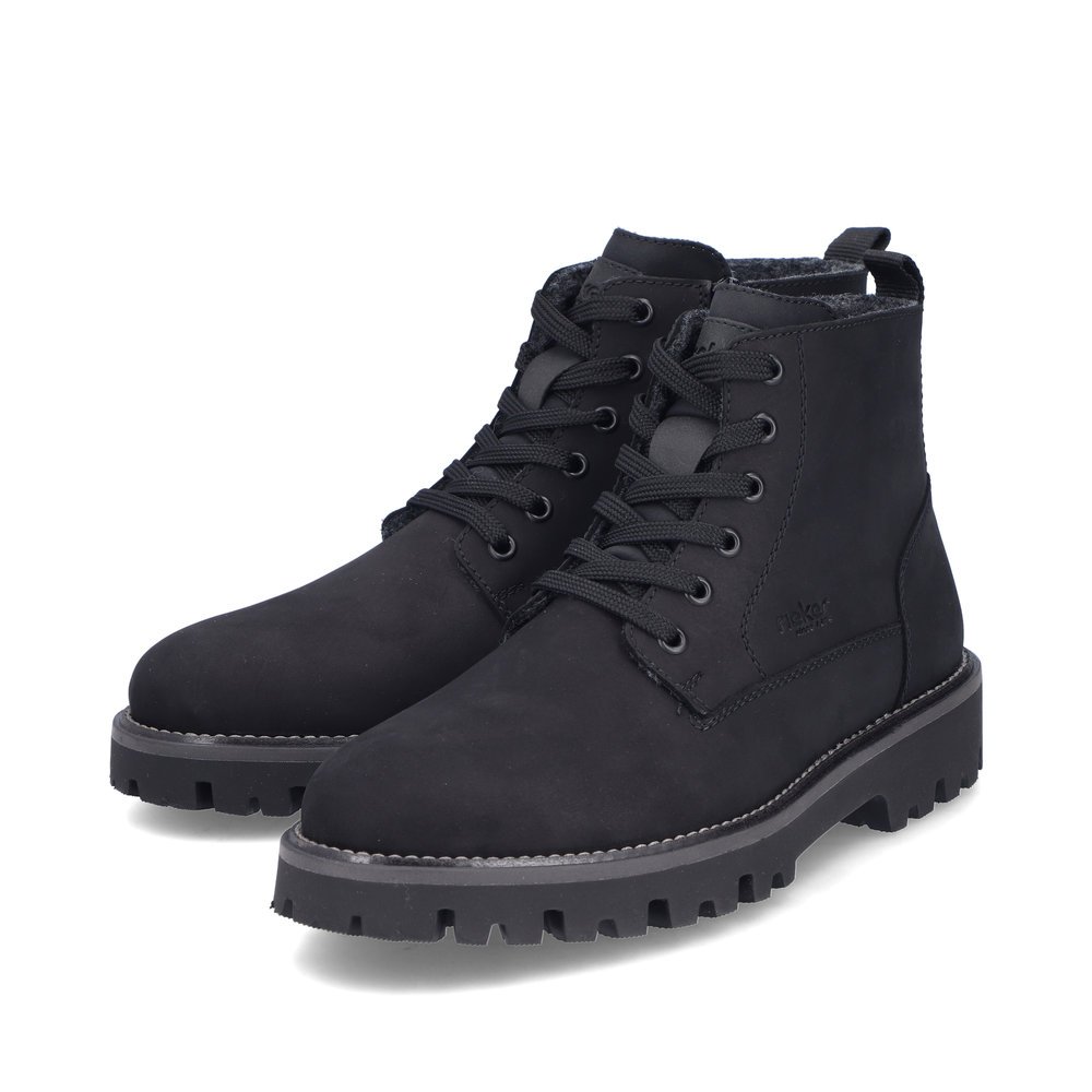 Black Rieker men´s lace-up boots 30430-00 with a zipper as well as extra width H. Shoes laterally.