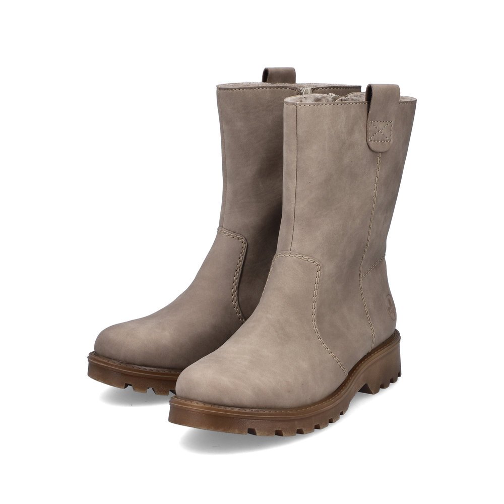 Bottines Rieker beiges pour femme 73290-65 avec fermeture éclair. Chaussures inclinées sur le côté.