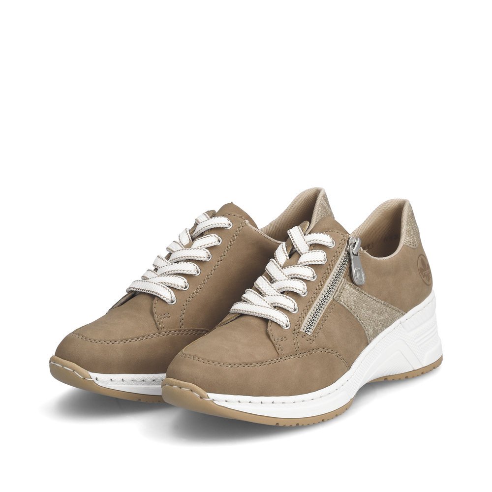 Beige Rieker women´s low-top sneakers N4319-62 with a zipper. Shoes laterally.