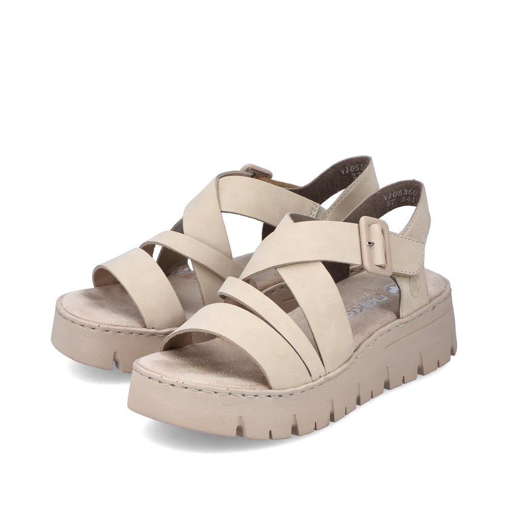 Beige Rieker women´s strap sandals V1063-60 with a hook and loop fastener. Shoes laterally.