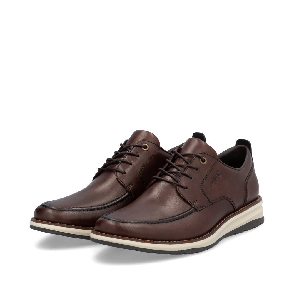 Chaussures à lacets Rieker marron pour homme 14704-25 avec largeur G 1/2. Chaussures inclinées sur le côté.