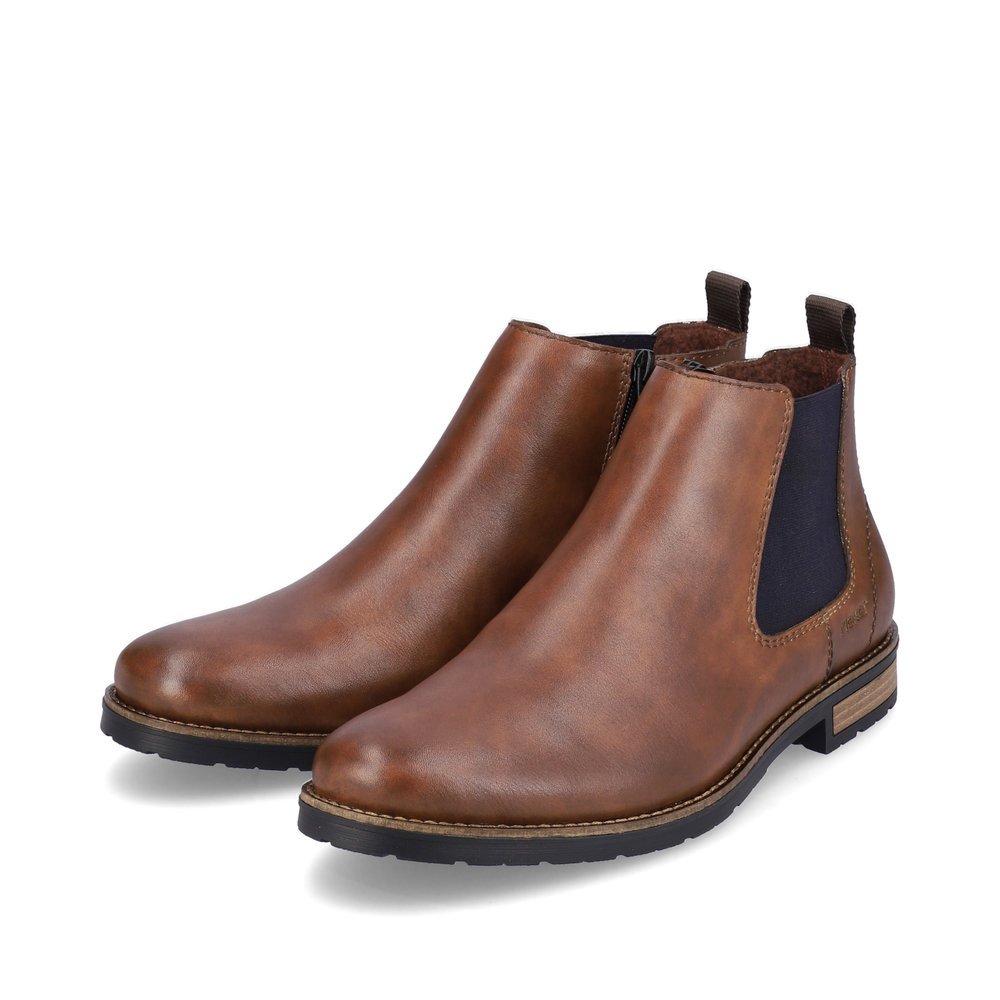 Chocolate brown Rieker men´s Chelsea boots 14653-24 with a zipper. Shoes laterally.