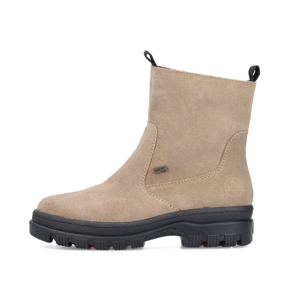 Clay beige Rieker women´s ankle boots X8250-64 with a Flip-Grip sole with spikes. Outside of the shoe.