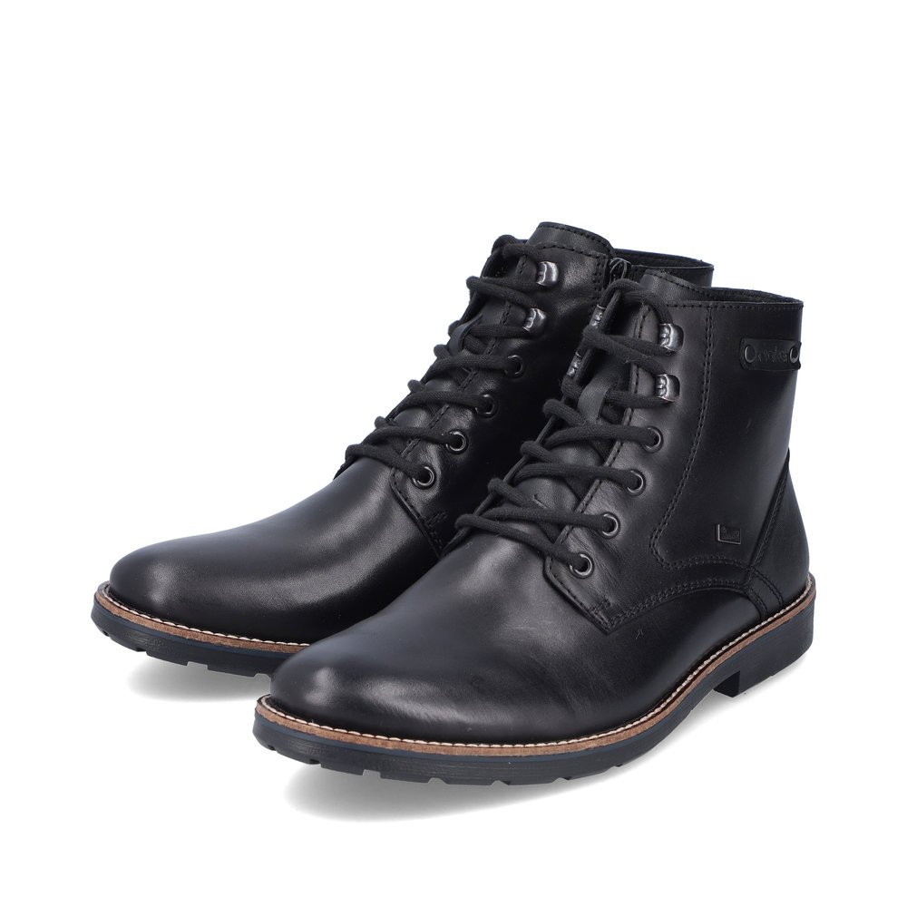 Black Rieker men´s lace-up boots 15322-00 with RiekerTEX membrane as well as zipper. Shoes laterally.